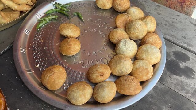 Pan shot of Khasta kachori in local Dhaba in Bihari Style. no face.