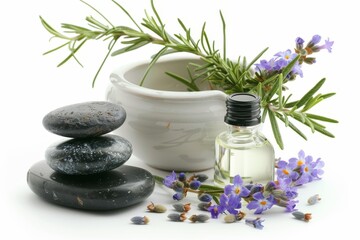 Rosemary sprigs in mortar with pestle spa stones essential oil bottle