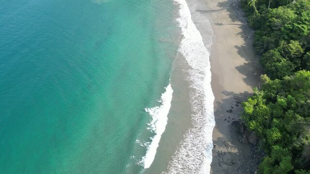 Secluded beach with turquoise waters in the Utr&iacute;a National Park between Bah&iacute;a Solano and Nuqu&iacute; in the Choc&oacute; department on the Pacific Coast of Colombia