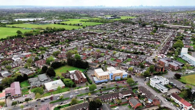 Aerial view of a church on Manford way in Hainault with London skyline in the distance