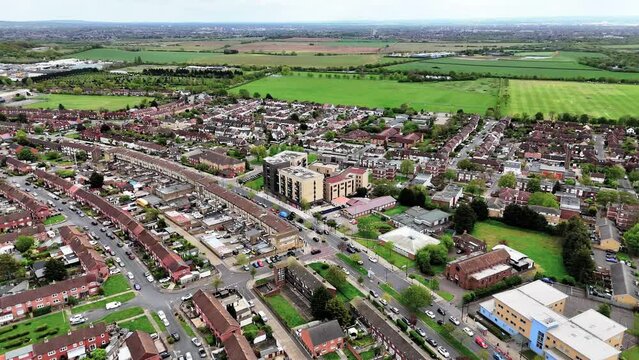 Aerial view of houses and a church in Hainault on Manford way