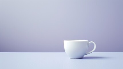 A simplistic setup of a solitary white cup centered on a smooth purple surface with ample space around it.