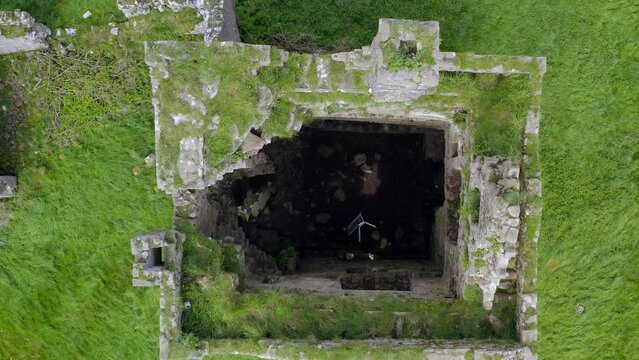 Srah Castle interior with tops covered in grass with anthropologic significance