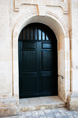 typical vintage Menorca door in stone building