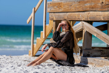 Lovely Blonde Bikini Model Posing Outdoors On A Caribbean Beach