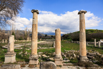 Behold the towering columns framing the site of the grand pool, a centerpiece of social life in the 2100-year-old city of Afrodisias, standing in quiet splendor against a backdrop of rural Aydın.