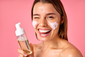 Cosmetology, beauty and spa treatment. Woman in lingerie on pink background.