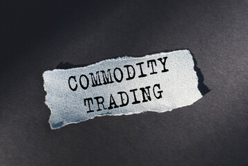 Torn Piece of Paper With the Words Commodity Trading