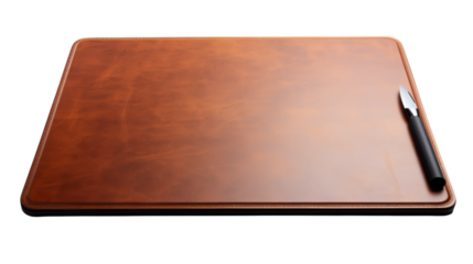 A wooden cutting board with a pen placed on top of it