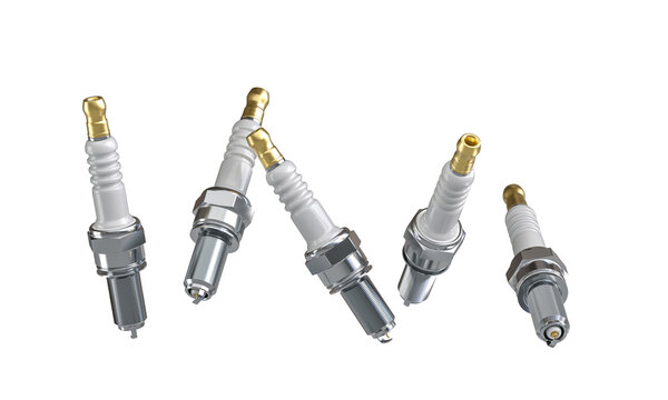 Set of new spark plugs isolated on white