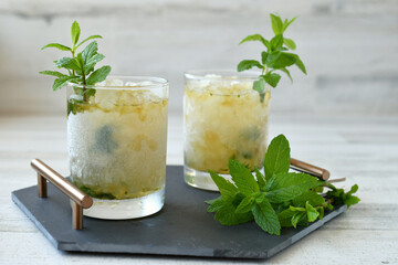 Classic Mint Julep cocktail in frosted glass with mint garnish to celebrate Kentucky Derby.