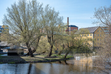 Motala Stream in the industrial landscape of Norrköping during spring in Sweden. Norrköping is a historic indsutrial town.