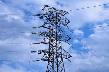Electric power transmission tower with cables connected