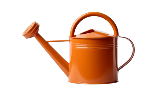 A bright orange watering can with a plastic handle resting on a table on transparent background