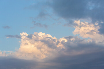 Dramatic sunset clouds in a blue sky, dynamic and inspirational themes