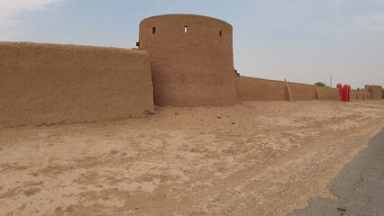 sand castle in the desert Village Desert House Sand Hut Desert Trees Bushes Dirt Path 