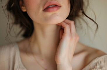 Close up of woman with neck pain, daylight, spa environment, beige , skin care commercial style, beauty advertising shot