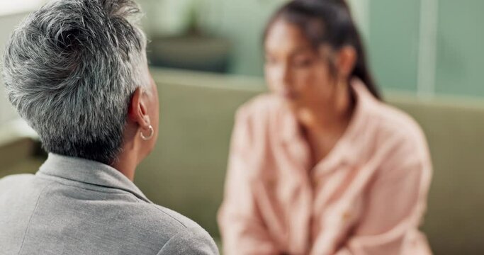 Woman, conversation and client at counseling session for psychotherapy or develop coping skills for emotions. Mature female therapist, communication and empathy for healing, mental health and advice.