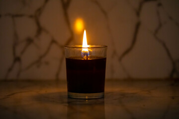 Relaxing and peaceful scene with burning aromatic candle