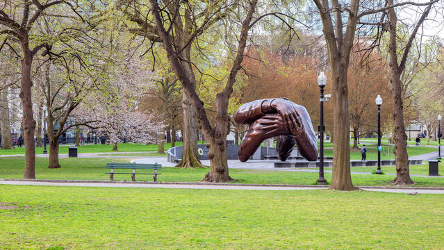Boston in Massachusetts, USA at Boston Commons in the spring season with the iconic Embrace sculpture remembering the Civil Rights Movement and Doctor King.