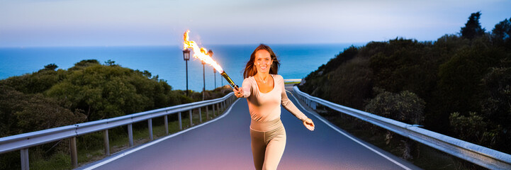 woman running holding a torch passing the baton