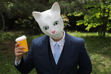 Businessman with a cat face 