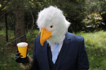 Businessman with an eagle face 