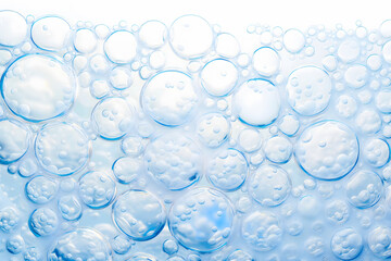 Bubbles in water on white background. Close-up.