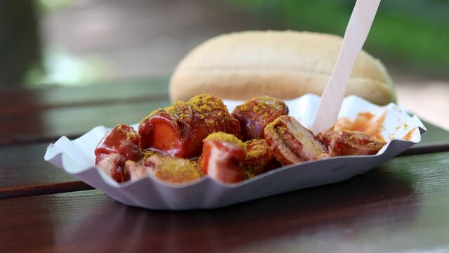 a delicious german currywurst sausage 4k 25fps video