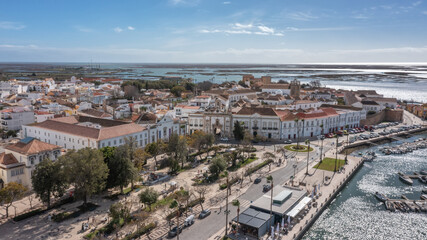 Portuguese town of Faro with old architecture, filmed by drone. Arco de villa and largo de se.