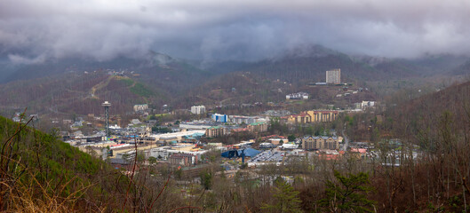 Gatlinburg Tennessee in the Smokey Mountains in an overview on a cloudy spring day.