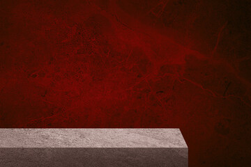 edge of grey slate stone counter with blank space for product montage display with red marble stone...
