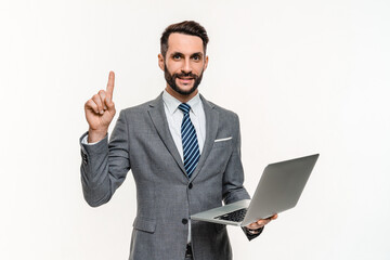 Smart happy businessman using laptop online and having idea isolated over white background. Caucasian office manager banker ceo boss promoting mobile applications