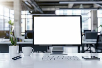 A white desk with a pc, coffee mug and pen on it. The screen is blank.
