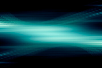 Neon blue motion light trails over black background. Abstract speed effect. Rays of light moving fast over dark background