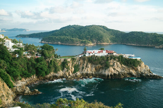 Beautiful Aerial view of a cliff with luxury homes in Acapulco Mexico