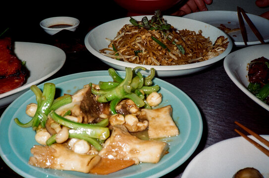 UGC film image with direct flash of chinese food