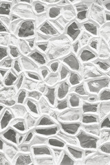 Granite block, gray and white giraffe skin texture. White stone cladding wall pattern and texture...