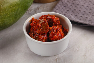 Spicy pickled raw green mango