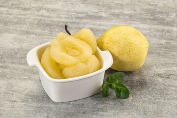 Canned yellow pear with syrup