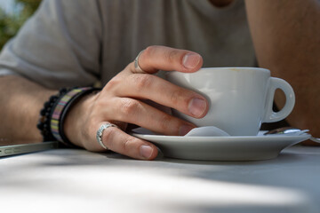 person holding cup of coffee