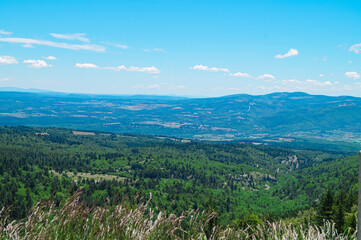 Aerial view of lush green valley seen from the top of Mount Ventoux in Provence region of southern...