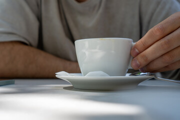 person holding a cup of coffee