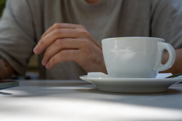 person holding cup of coffee