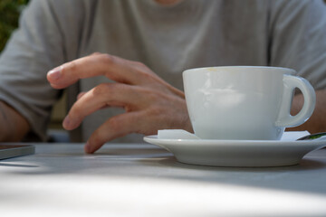 person holding a cup of coffee