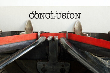 Conclusion is shown using the text on Vintage Typewriter for conclusion presentation