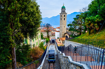 Sassellina funicular (Citta-Stazione funicular rides along San Lorenzo Cathedral, Lugano,...