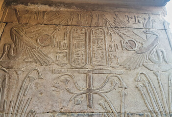 Twin Uraeus,sacred cobras bless the cartouche of Ptolemy VI Philometer in this wall relief at the...