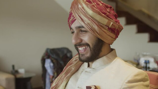 Close-up Of An Indian Punjabi In Traditional Wedding Clothing With Turban.