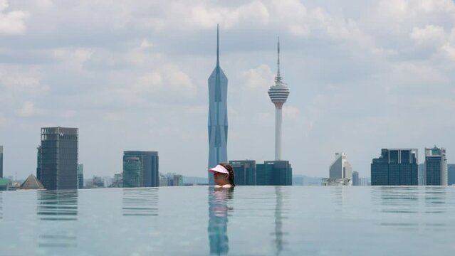 Rooftop Infinity Pool With KL Tower In The Background In Kuala Lumpur, Malaysia. Static Shot
